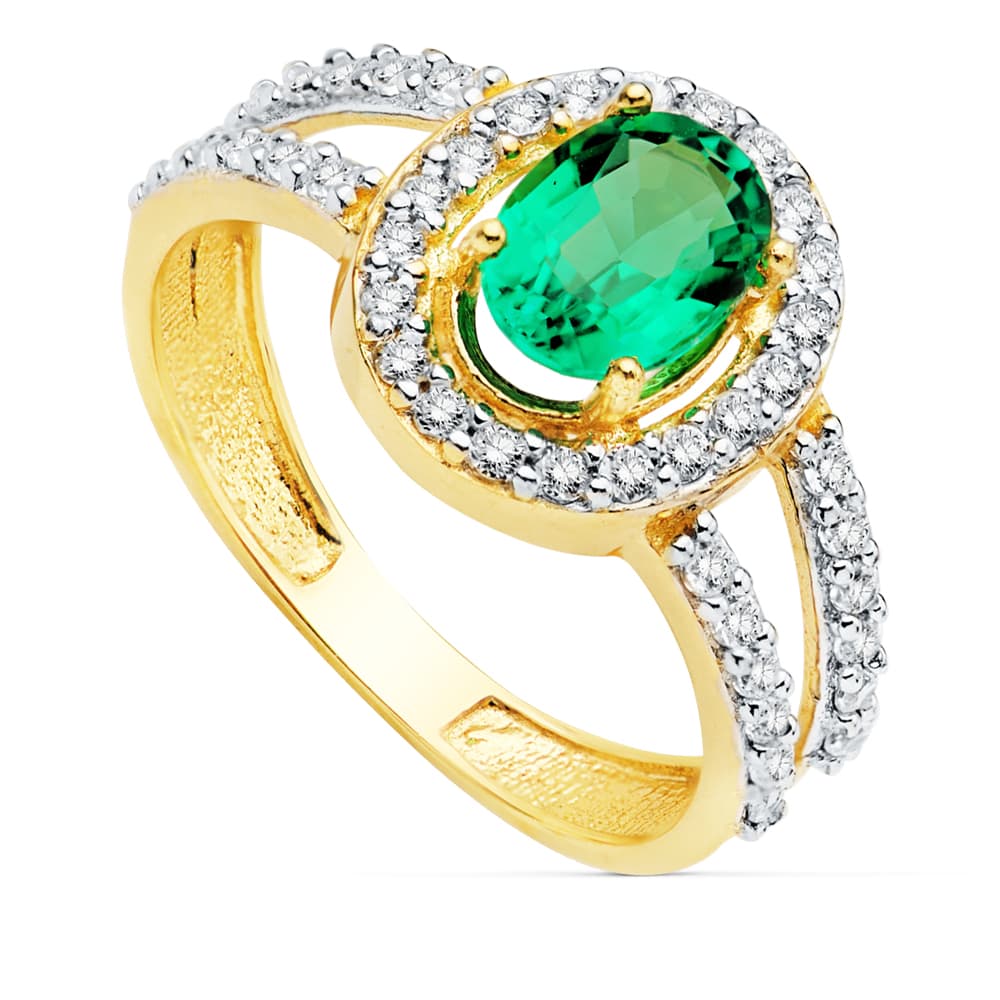 18K SORTIJA ESMERALDA 0.79 QT.7X5 MM CIRCONITAS